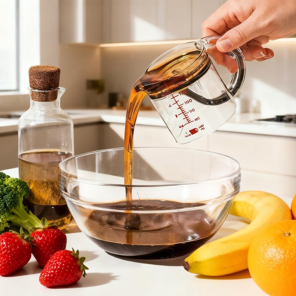 Adjustable Measuring Cup with Scraper Base – Space-Saving, Easy Clean, Metric & Imperial